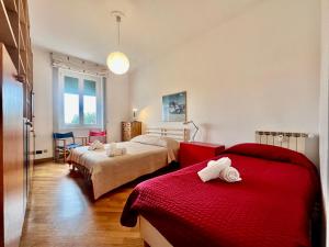 A bed or beds in a room at Casa Pinturicchio