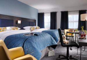 Llit o llits en una habitació de Temple Bar Hotel