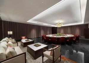 Posezení v ubytování Zhengzhou East Station Longzi Lake University Area Qianna Yuanxi Hotel