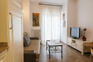 TV a/nebo společenská místnost v ubytování La Casa dels Abeuradors