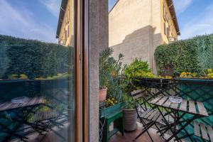 Charming Room Battaglia Appartamenti陽台或露臺