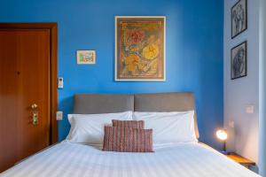 Postel nebo postele na pokoji v ubytování Charming Room Battaglia Appartamenti