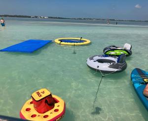 a group of inflatable tubes in the water at Snorkel in Islamorada's Clear Blue Waters in Islamorada