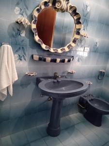 Koupelna v ubytování Il Corbezzolo Appartamenti