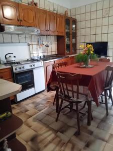 Kuchyň nebo kuchyňský kout v ubytování Il Corbezzolo Appartamenti