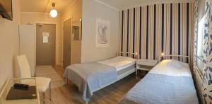 Voodi või voodid majutusasutuse Svefi Vandrarhem - Hostel toas
