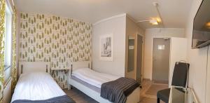 Voodi või voodid majutusasutuse Svefi Vandrarhem - Hostel toas