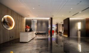 Fotografie z fotogalerie ubytování Zhengzhou East Station Longzi Lake University Area Qianna Yuanxi Hotel v destinaci Čeng-čou