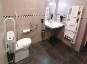 Koupelna v ubytování Hôtel Le Dormeux