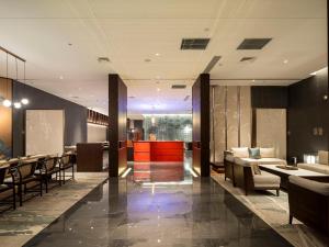 Posezení v ubytování Zhengzhou East Station Longzi Lake University Area Qianna Yuanxi Hotel
