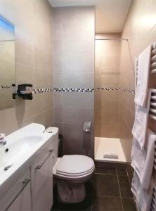 Koupelna v ubytování Hôtel Le Dormeux