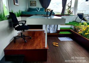 a office with a desk and a chair in a room at Mi Amor Ocean Penthouse - 3 minutes to the beach - Downtown in Phu Quoc +46 photos
