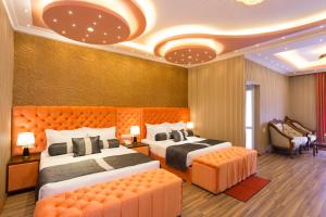 Postel nebo postele na pokoji v ubytování Hotel Grand Turf By GSP