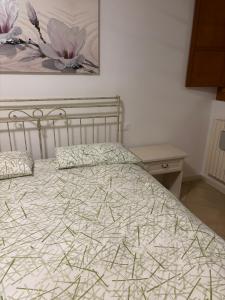 A bed or beds in a room at Agriturismo Nonna Bettina