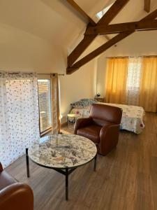 Posezení v ubytování Chambre dans une Ecurie
