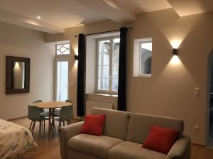 Posezení v ubytování Ancien Couvent au Cœur du vieux Valence