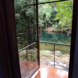 a view of a river from a window at Phen's House in Ko Chang