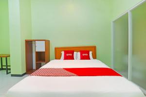 Galeriebild der Unterkunft OYO 91351 87 Guest House in Balian