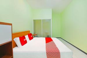 Galeriebild der Unterkunft OYO 91351 87 Guest House in Balian