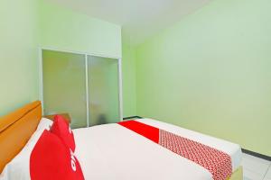 Galeriebild der Unterkunft OYO 91351 87 Guest House in Balian