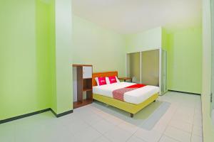 Galeriebild der Unterkunft OYO 91351 87 Guest House in Balian