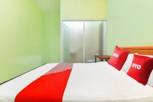 Galeriebild der Unterkunft OYO 91351 87 Guest House in Balian