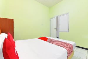 Galeriebild der Unterkunft OYO 91351 87 Guest House in Balian