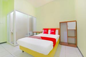 Galeriebild der Unterkunft OYO 91351 87 Guest House in Balian