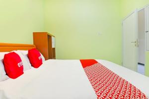 Galeriebild der Unterkunft OYO 91351 87 Guest House in Balian