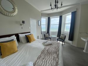 Oban Hotel客房内的一张或多张床位
