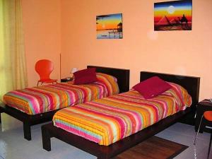 Posteľ alebo postele v izbe v ubytovaní B&B CasAnsaldo