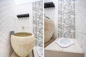 Koupelna v ubytování OYO 91403 Reva Residence Syariah