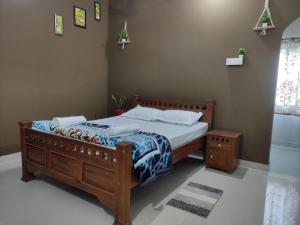 Postel nebo postele na pokoji v ubytování Jungle View Eco Village