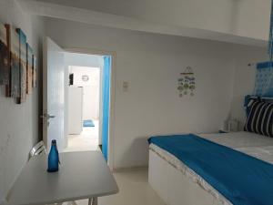 Ένα ή περισσότερα κρεβάτια σε δωμάτιο στο SEA NEST Paros House