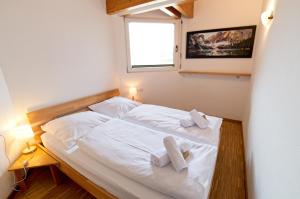 Ein Bett oder Betten in einem Zimmer der Unterkunft Boardinghouse Steinen