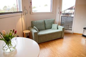 Ein Sitzbereich in der Unterkunft Boardinghouse Steinen