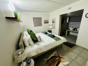 Ένα ή περισσότερα κρεβάτια σε δωμάτιο στο FarmStay