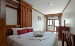 Postel nebo postele na pokoji v ubytování Tony Resort