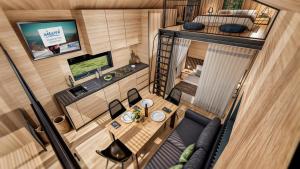 TV a/nebo společenská místnost v ubytování Lakeside Petzen Glamping