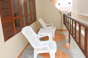 Balkón nebo terasa v ubytování Tony Resort + 37 fotografií