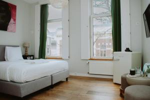 Letto o letti in una camera di King Kong Hostel