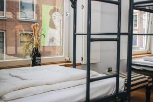 Letto o letti in una camera di King Kong Hostel