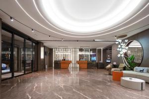 Vstupní hala nebo recepce v ubytování Ward Hotel, Hualiancheng Branch, Lankao Station Road