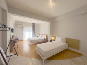 Ένα ή περισσότερα κρεβάτια σε δωμάτιο στο Seagull apartments by halu! Building B