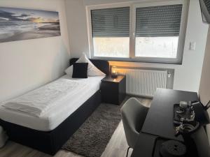 Postel nebo postele na pokoji v ubytování Hotel Mietz