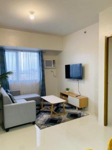 TV a/nebo společenská místnost v ubytování Condo