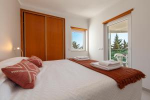 Ένα ή περισσότερα κρεβάτια σε δωμάτιο στο Quinta Dos Pinheiros +89 φωτογραφίες