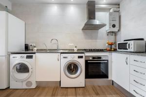 Kuchyň nebo kuchyňský kout v ubytování Loft Jb