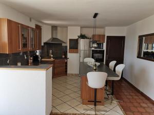 Köök või kööginurk majutusasutuses Superbe villa vue et emplacement exceptionne