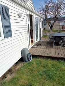 Garður fyrir utan Stacaravan Bredene met tuin nr 2126
